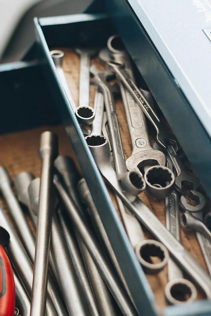 A drawer of combination wrenches and sockets